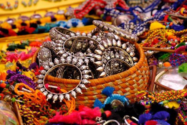 Indian Handcrafted jewellery and bangles displayed in local shop in a market of Pune, India, silver oxidised jewellery, Gold, Silver as beauty accessories by Indian women.